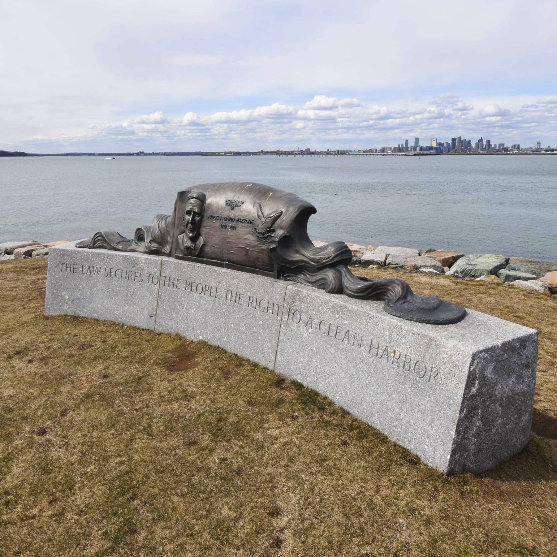 The law secures to the people the right to a clean harbor with Boston Skyline in background